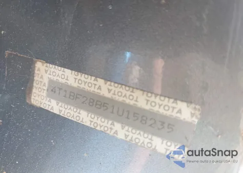 2001 Toyota Avalon Xls z USA, uszkodzony, nr VIN 4T1BF28B51U158235